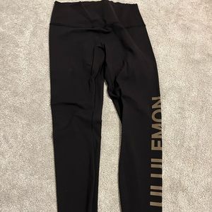 Lululemon Leggings with gold logo on leg - Size 10